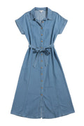 Yanet Collection Shop August sky light blue denim midi shirt dress with short sleeves, collar, and waist tie belt.