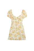 Yanet Collection Shop floral mini dress with short puff sleeves, square neckline, and gathered bodice detail.