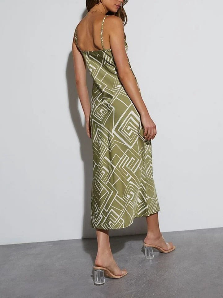 Yanet Collection Shop sage green maxi dress with white geometric print, spaghetti straps, and back view on a model.