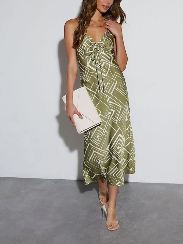 Yanet Collection Shop sage green maxi dress with white geometric print, V-neck, spaghetti straps, and drawstring front
