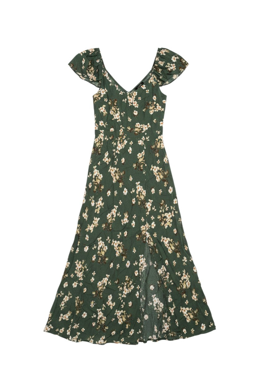 Yanet Collection Shop green floral maxi dress with short flutter sleeves, v-neckline, and a front leg slit.