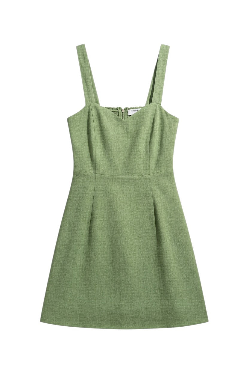 Yanet Collection Shop green sleeveless sheath dress with a sweetheart neckline and textured fabric finish.