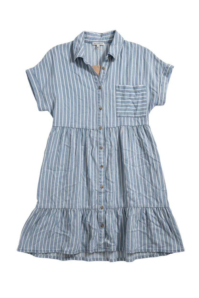 Yanet Collection Shop light blue striped button-down dress with short sleeves, chest pocket, and a ruffled hem.