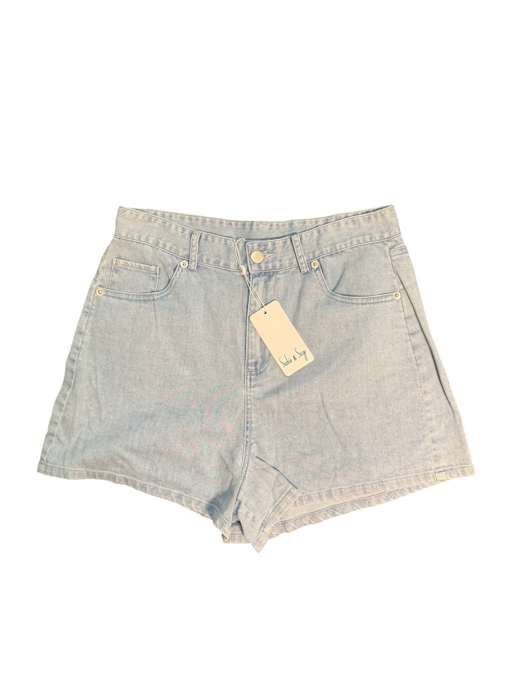 Yanet Collection Shop light wash denim high-waisted shorts with a tag attached, laid flat on a dark surface.