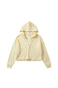 Yanet Collection Shop light yellow long sleeve hoodie with a relaxed fit, v-neckline, and soft textured fabric.