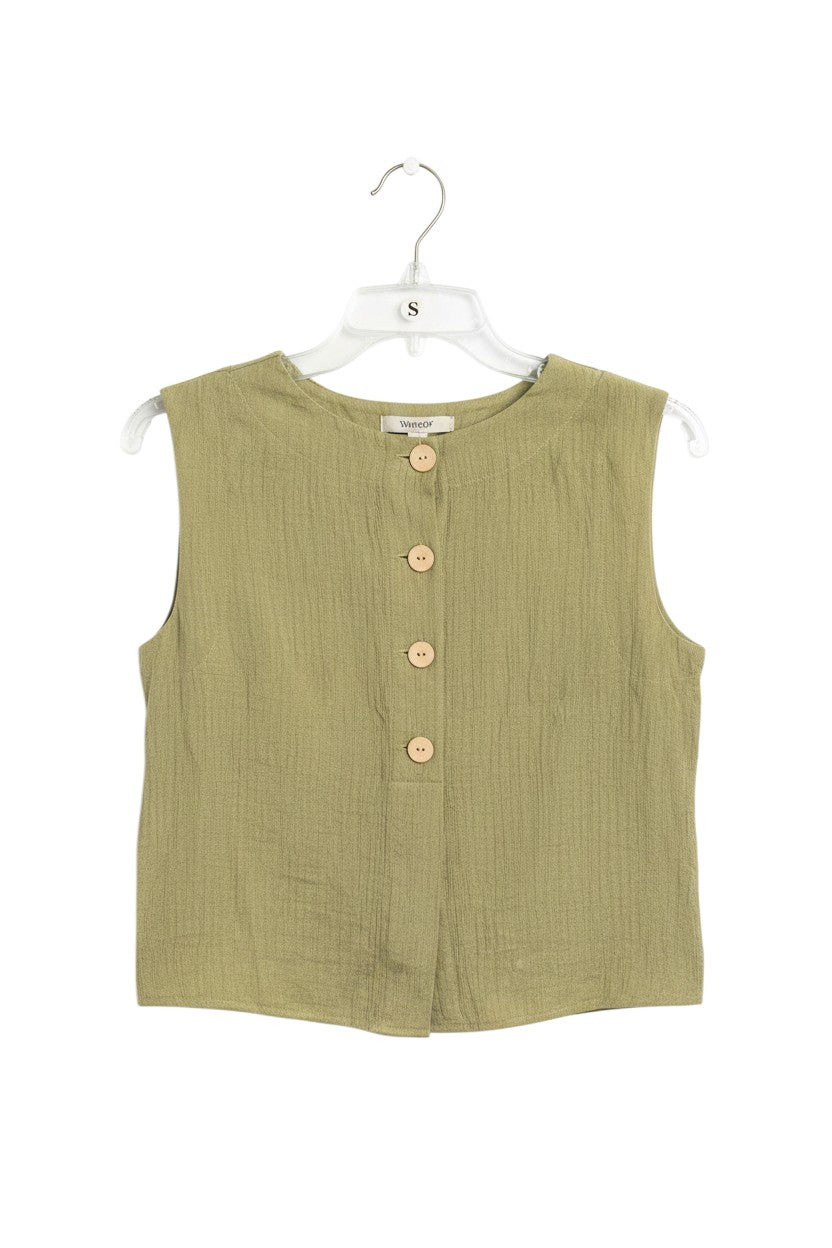 Yanet Collection Shop lime green sleeveless crop top with textured fabric and front button closure on a hanger