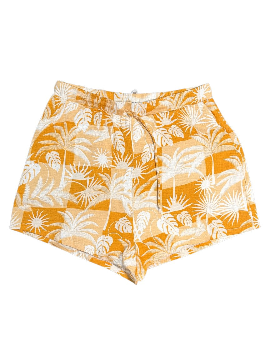 Yanet Collection Shop mustard yellow shorts with a white tropical palm leaf and sun print and elastic waistband