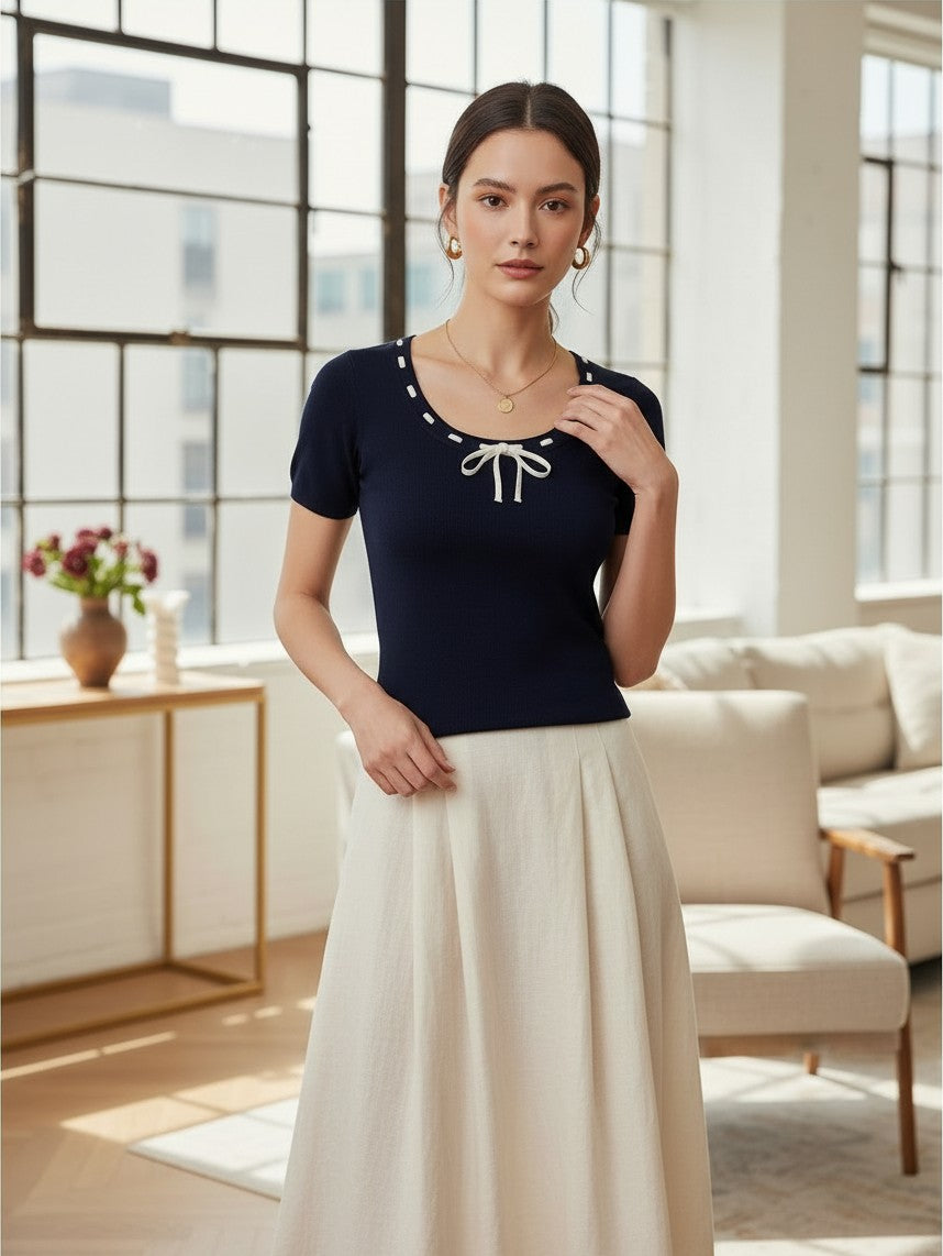 Yanet Collection Shop navy short sleeve fitted top with a round neckline and white decorative tie detail