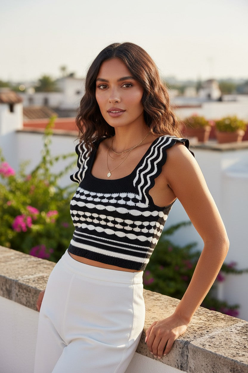 Yanet Collection Shop navy and white sleeveless crop top with scalloped edges and textured knit on a model outdoors