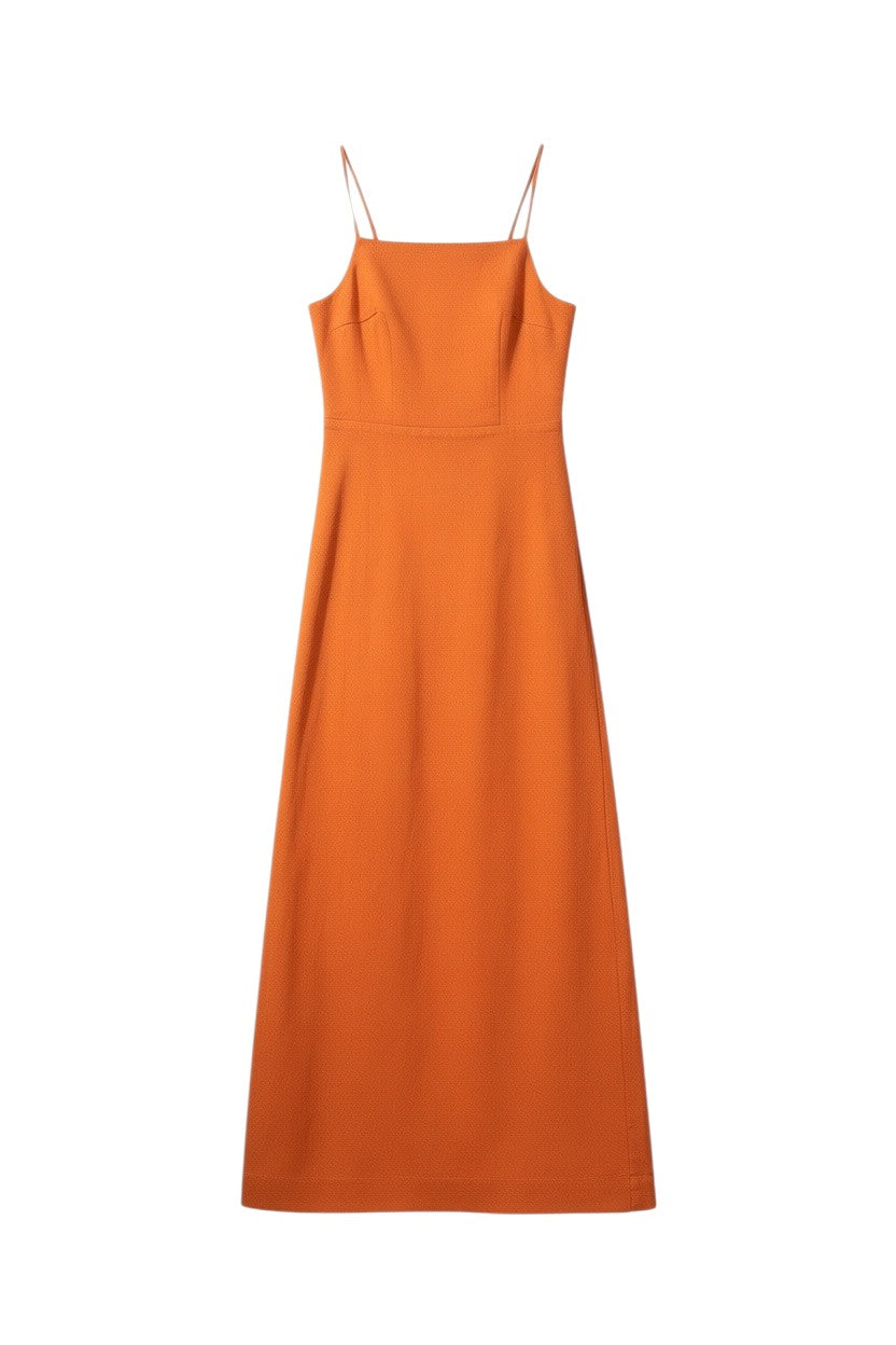 Yanet Collection Shop orange sleeveless maxi dress with delicate spaghetti straps and a floor-length silhouette.