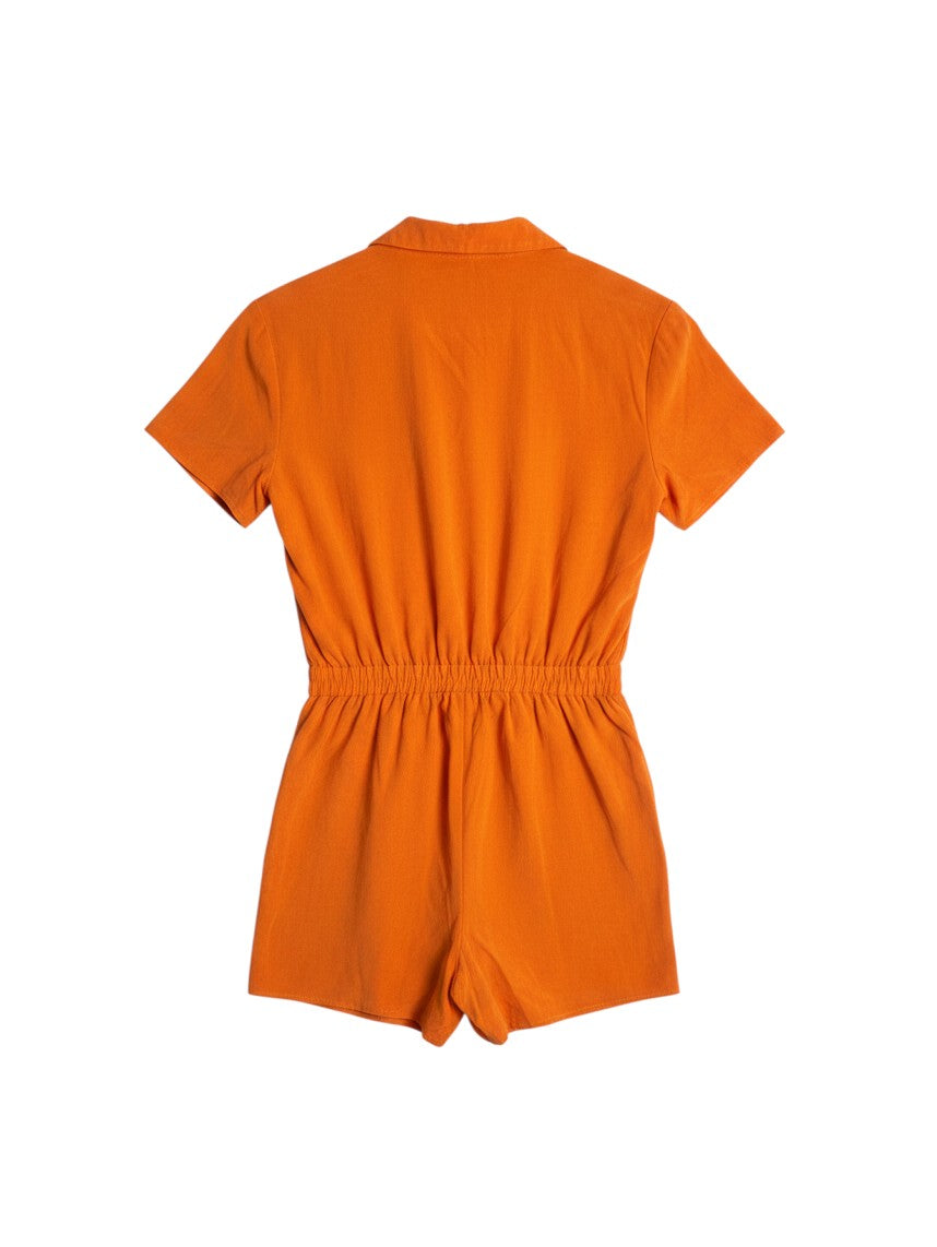 Back view of a bright orange Yanet Collection Shop short-sleeve romper with a collared neckline and elastic waist.