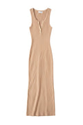 Yanet Collection Shop peach ribbed sleeveless maxi dress with a fitted silhouette and button neckline detail.