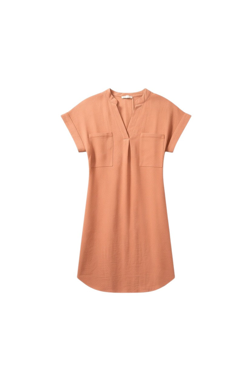 Yanet Collection Shop peach short sleeve tunic dress with a V-neck, chest pockets, and a relaxed knee-length fit.