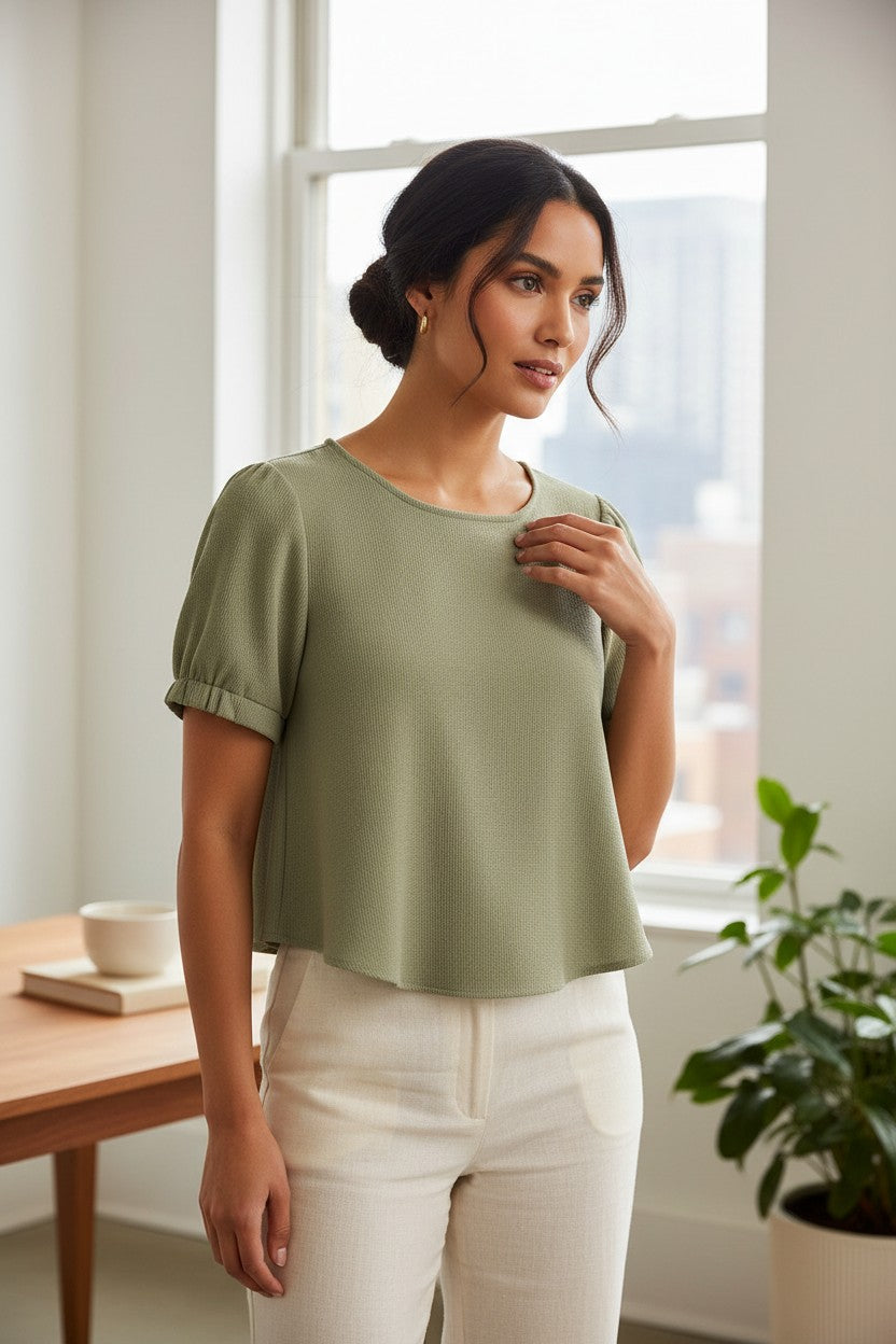 Yanet Collection Shop sage green short sleeve crop top with textured fabric and relaxed fit worn by a woman