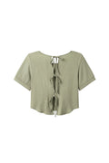 Yanet Collection Shop sage green short sleeve blouse with back tie details and textured fabric in a relaxed fit