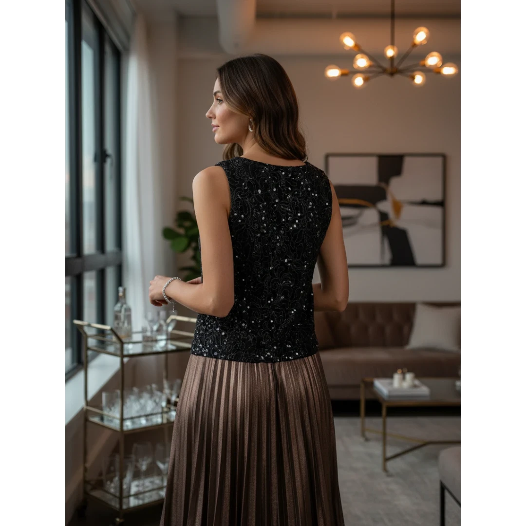 Yanet Collection Shop black sleeveless sequin top paired with a metallic bronze pleated midi skirt