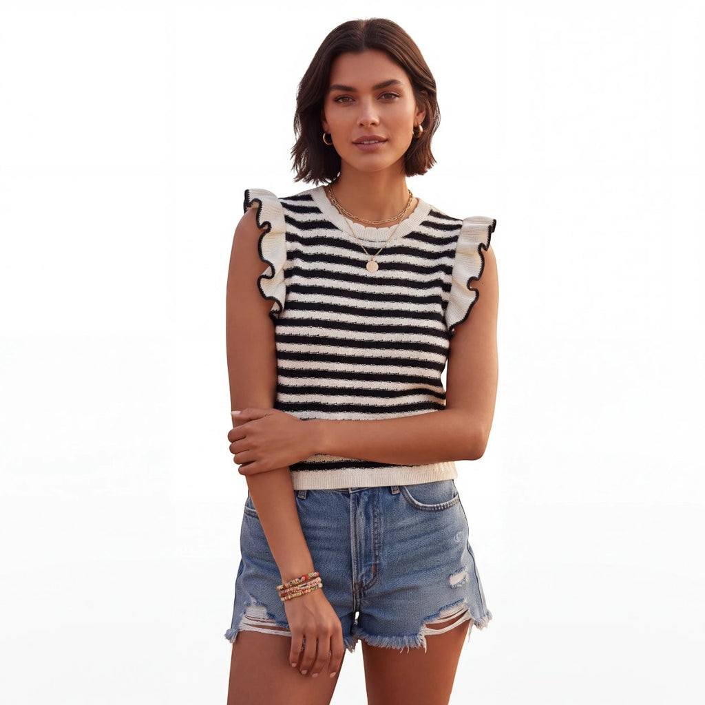 Yanet Collection Shop black and white striped knit top with ruffle sleeves worn by a woman with denim shorts