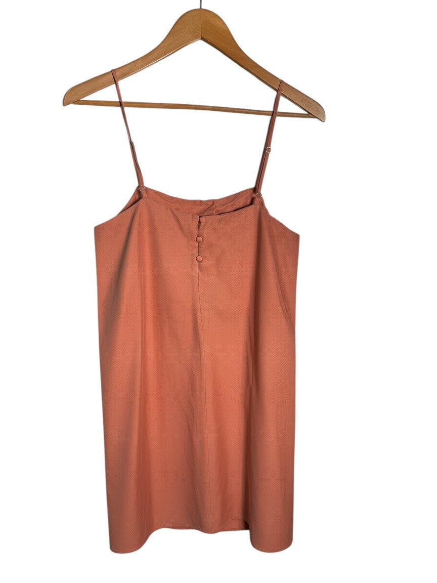 Yanet Collection Shop terracotta spaghetti strap camisole with decorative front buttons on a wooden hanger