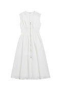 Yanet Collection Shop white sleeveless maxi dress with a cinched waist and front zipper detail in a flowy silhouette.