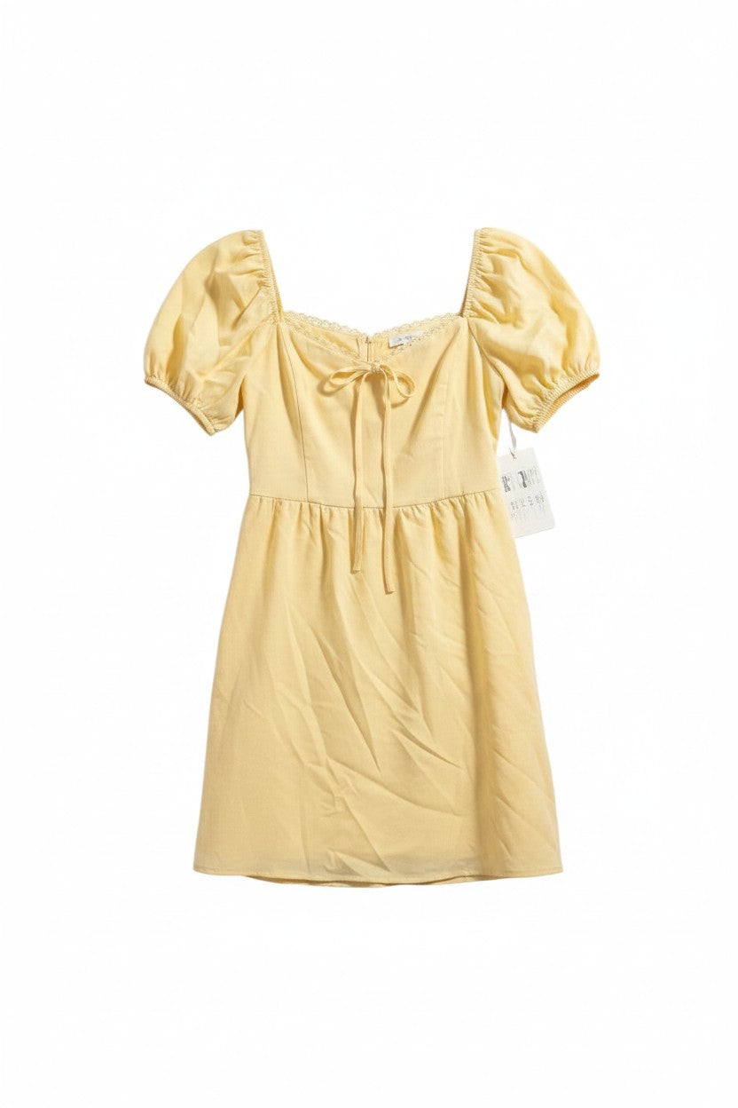 Yanet Collection Shop yellow mini dress with short puff sleeves and a delicate tie neckline in a relaxed fit